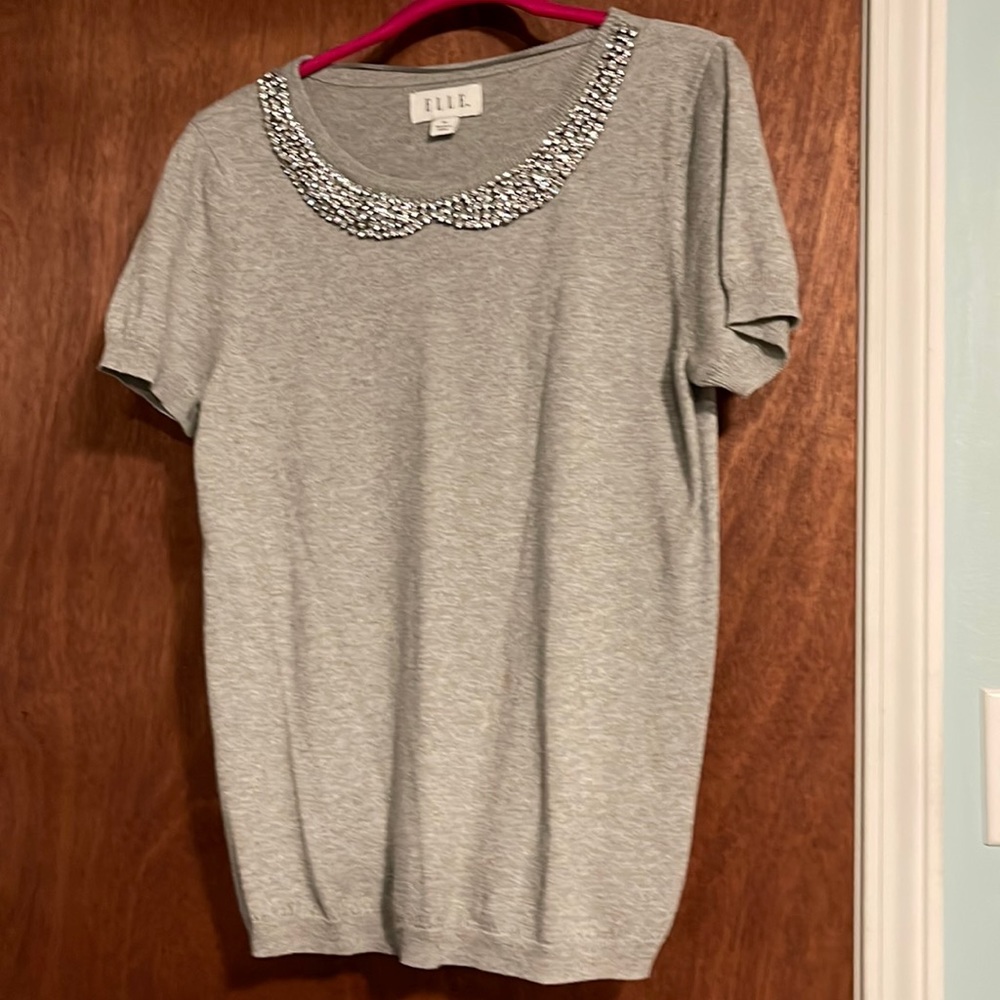 Elle short sleeve M sweater with rhinestone collar. New. Only tried on.